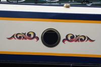 Traditional Style Vinyl Lettering for Narrowboats Porthole with Scroll either side